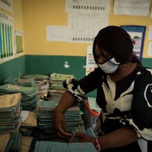 Health care staff looking through medical records